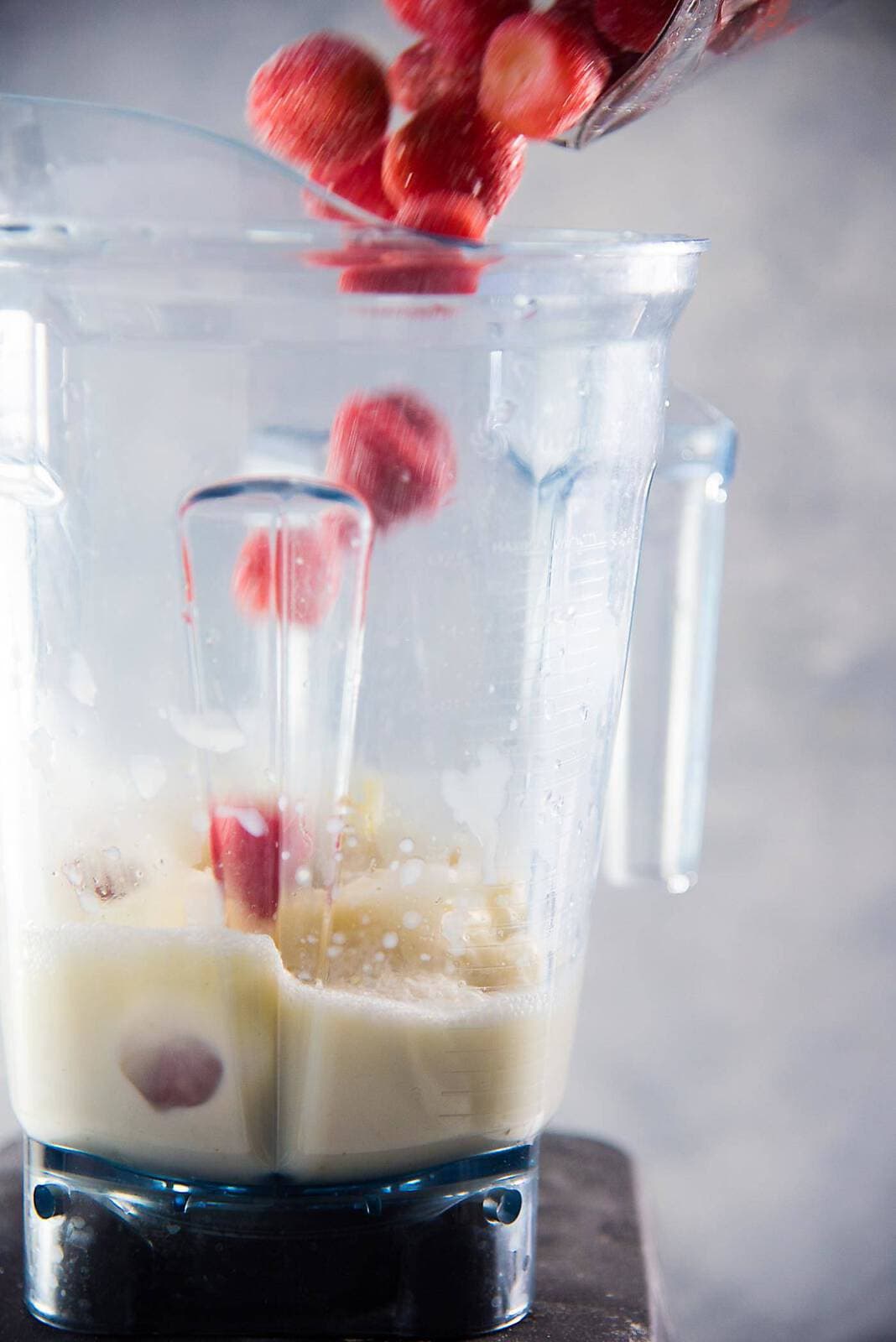 Green Tea Almond Strawberry Smoothie - a creamy almond and strawberry smoothie with Sencha tea (Green tea), that will keep you energized and full through to lunch!