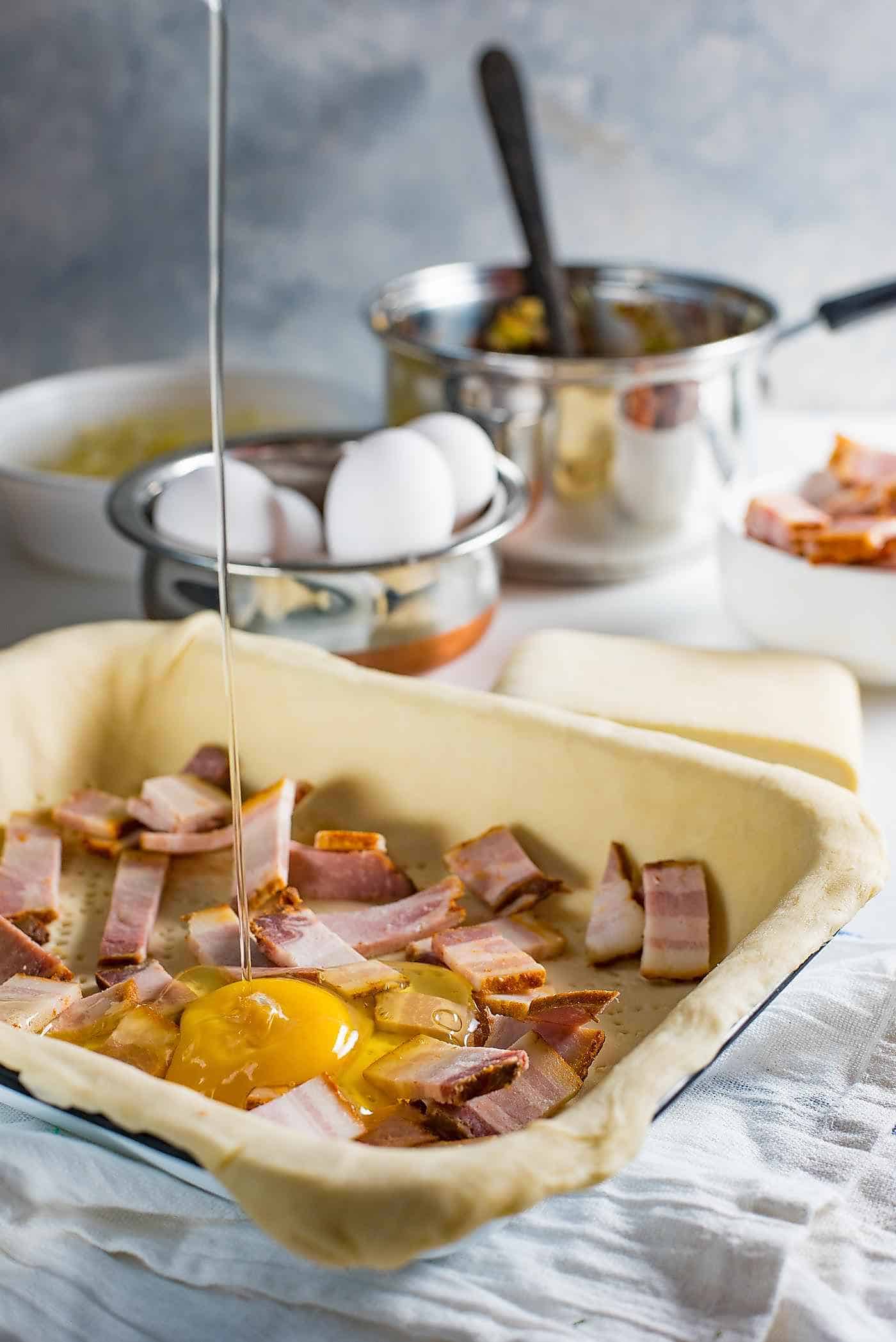 Preparing Bacon and egg pies, step by step. 