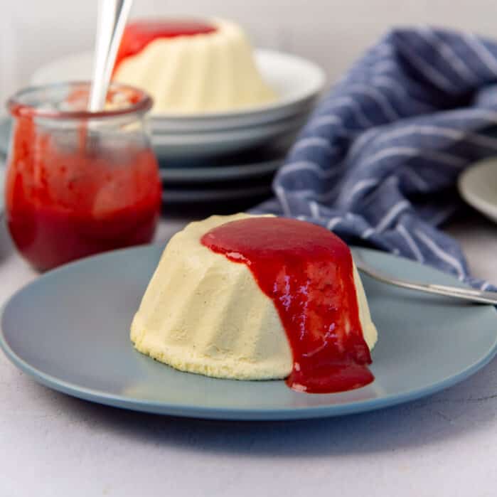 Bavarian Cream Square Image - White patterned pudding served on a blue plate.