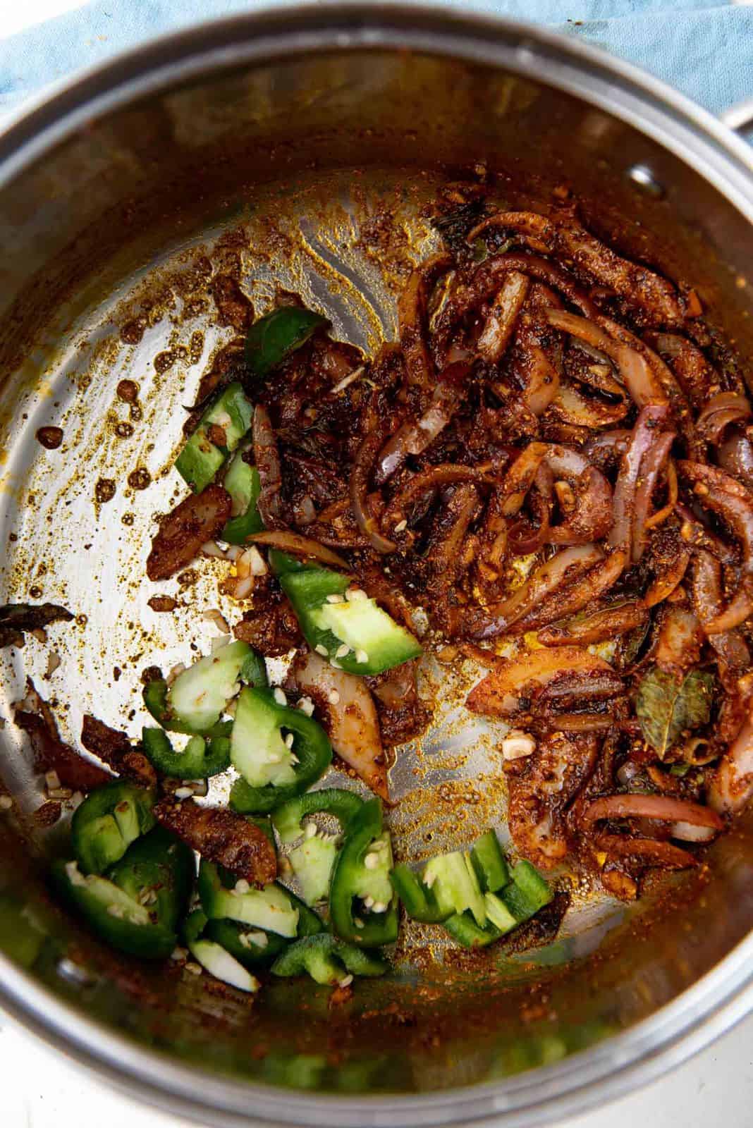 The sauteed curry base with the the spices