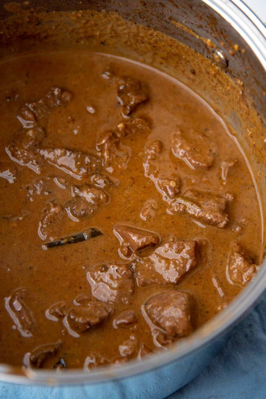 Creamy beef curry after adding coconut milk