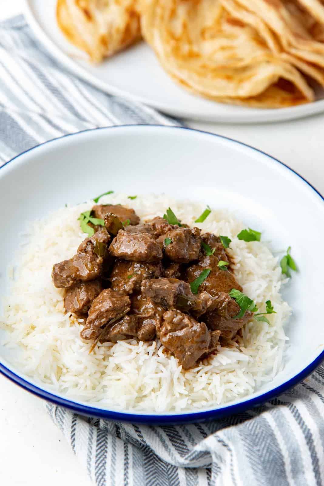 Beef curry served on a bed of white rice