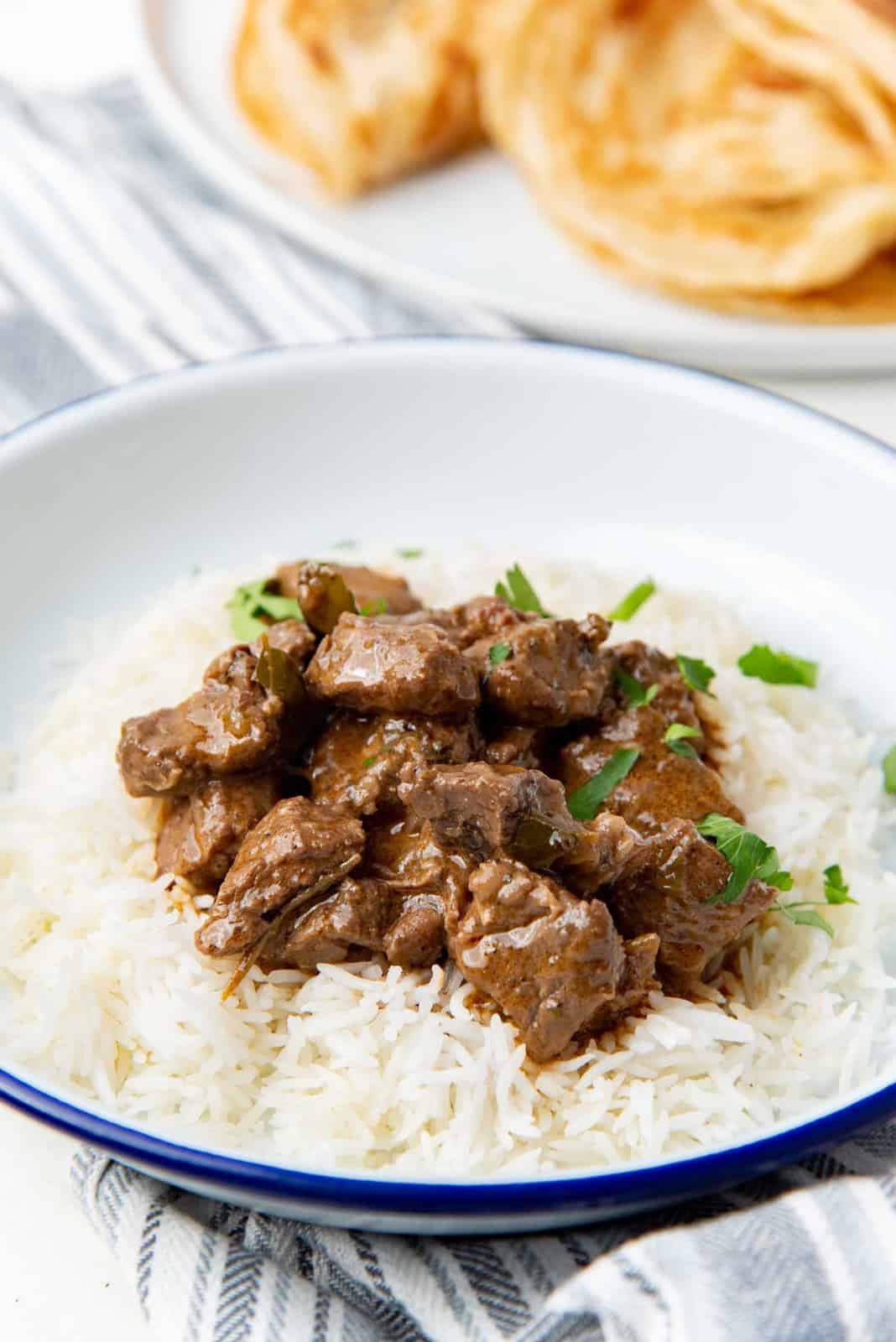 A close up of Sri Lankan beef curry served with rice