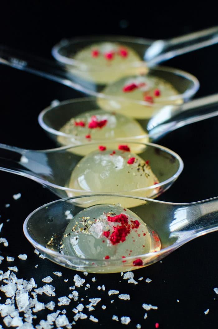 Black Pepper infused Spicy Margarita Spheres made using Molecular Gastronomy! These mini shots are sure to make any party a success! Delicious Margarita shots with a spicy kick, really wakes up all of your senses.Make sure you make plenty, as you will want to have alot! Can also be served in shot glasses (without Reverse Spherification)