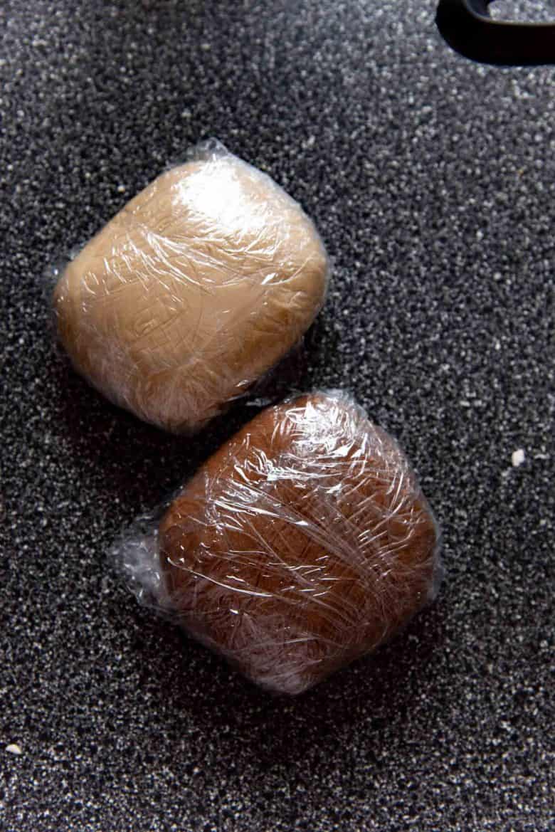 The light boba pearls and the dark boba pearl dough wrapped in plastic wrap