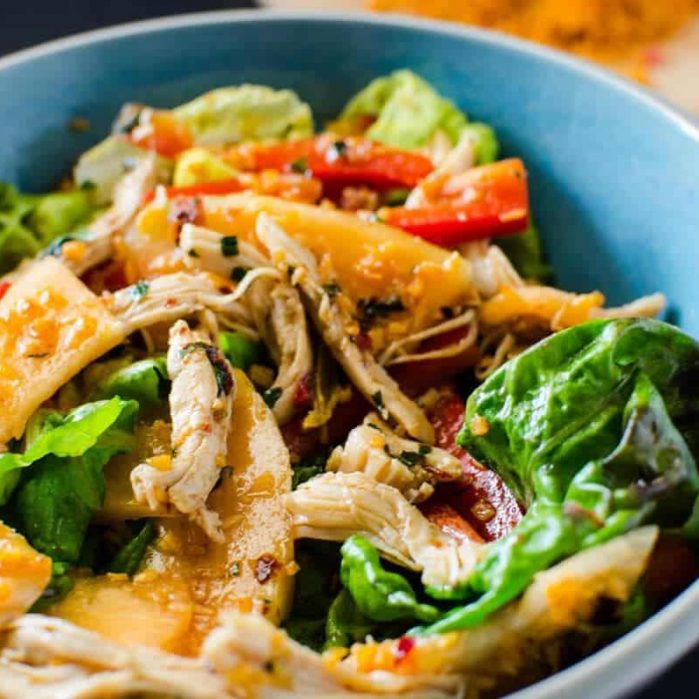 Chicken and Melon Salad with Coconut Sambol - A delicious and fresh Chicken and Melon Salad with a tangy and spicy tamarind dressing and a spicy coconut sambol topping