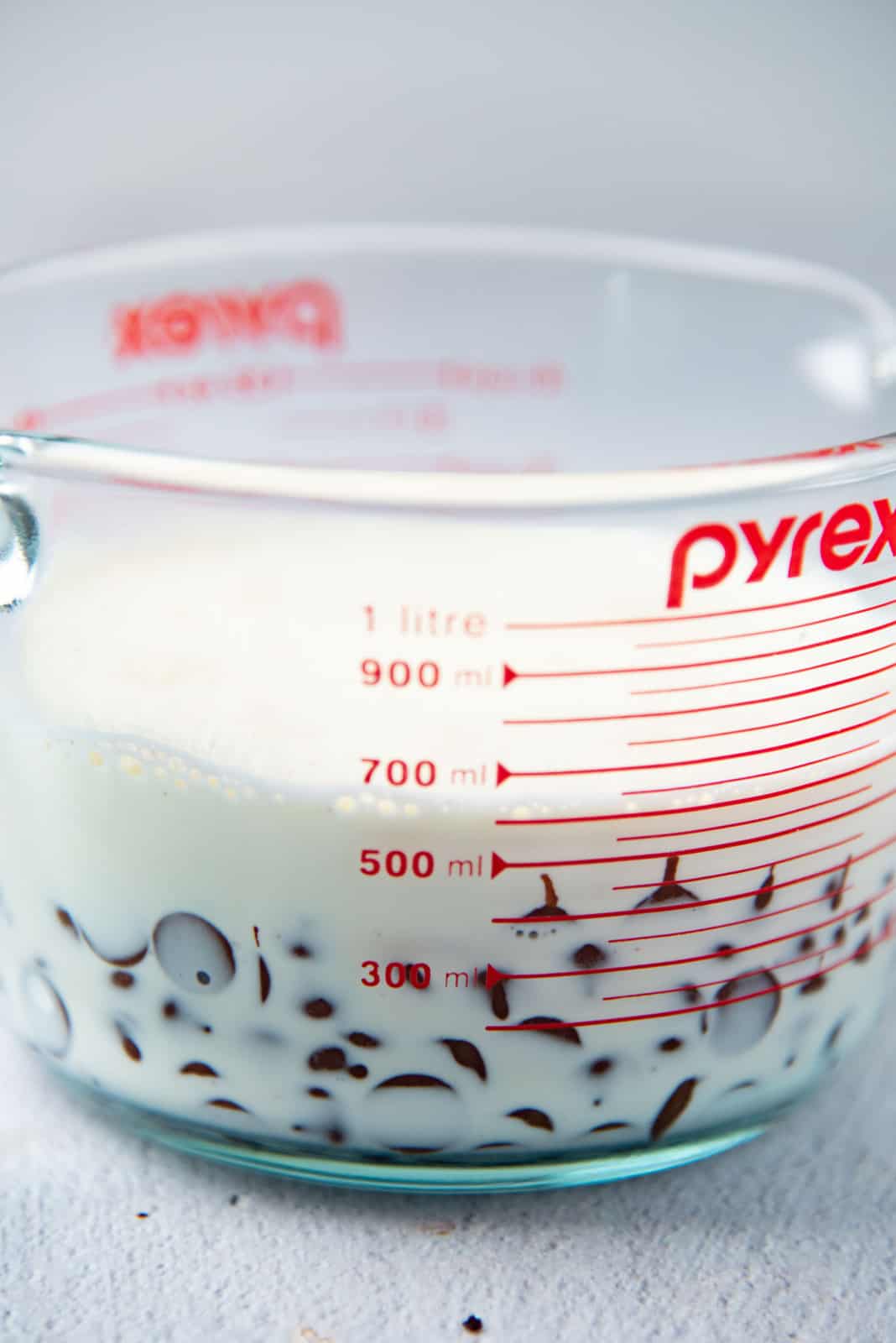 Hot cream and chocolate in a large jug