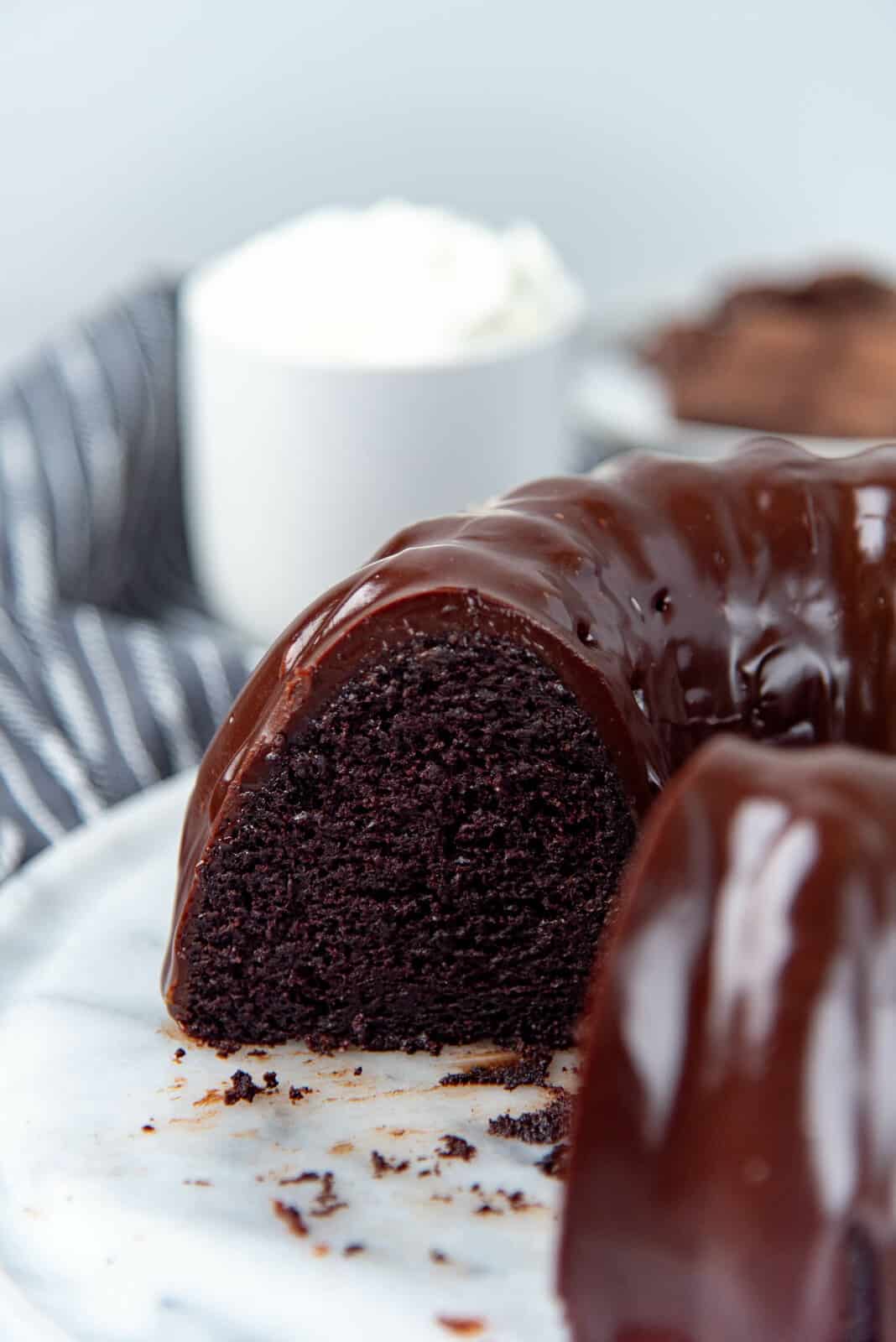 A close up of the cut bundt cake to show the texture and crumb of the cake after cutting it.