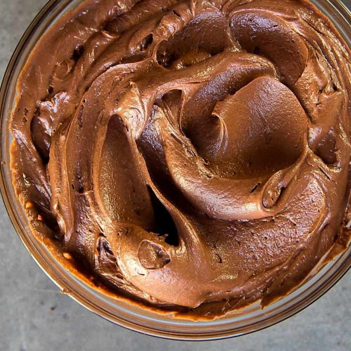 Creamy Chocolate Buttercream Frosting - fluffy, creamy, melt in your mouth soft chocolate buttercream with deep chocolate flavor! Plus it's super easy to make!