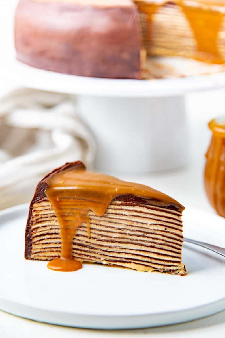 A slice of the chocolate crepe cake on a plate