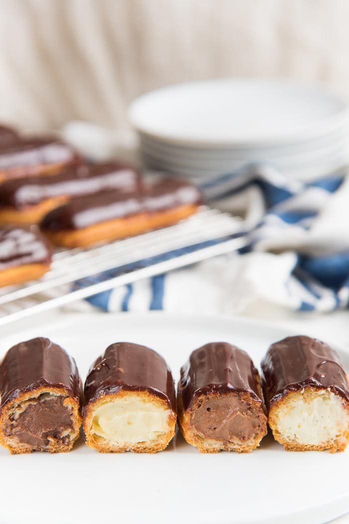 Classic Eclairs with four types of filling, Vanilla pastry cream. Chocolate pastry cream, Vanilla diplomat cream. Chocolate diplomat cream.