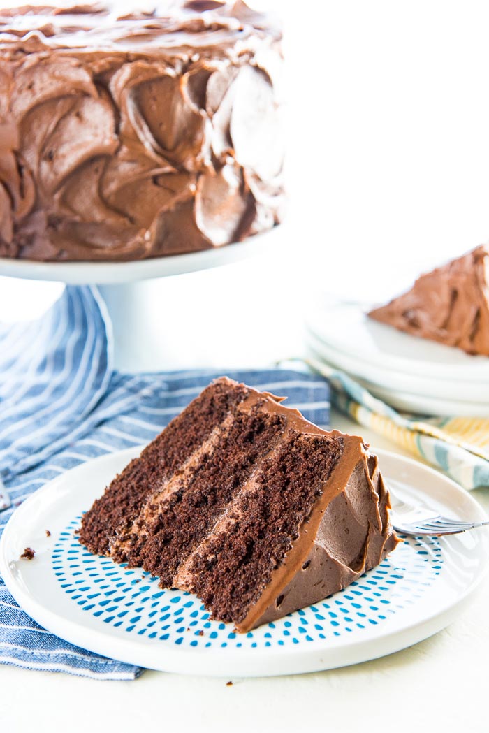 This Classic Chocolate Cake is the only and best chocolate cake recipe you will ever need! It has layers of soft, airy chocolate cake layers, with a creamy, buttery, melt in your mouth Chocolate buttercream frosting. Perfect cake for Birthday cake, or any occasion.