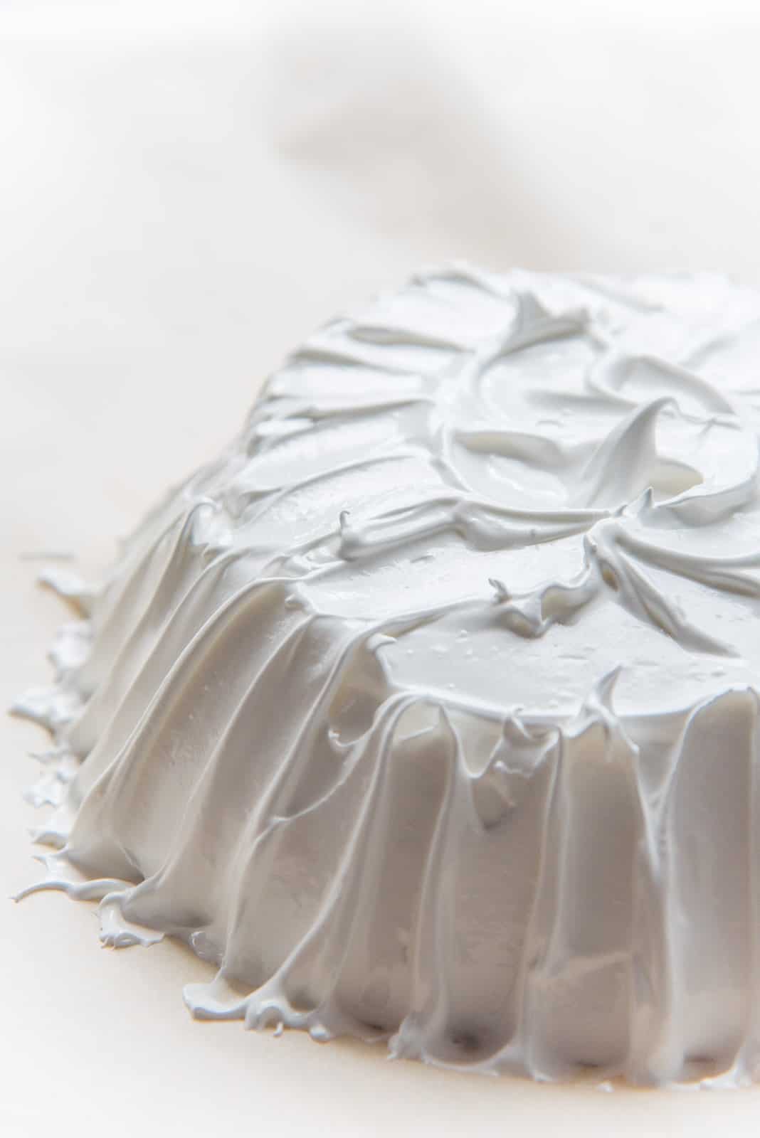 How to make pavlova - smooth out the edges and swirl the middle of the pavlova