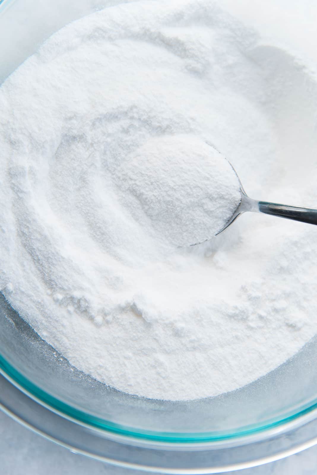 Sugar that has been pulsed in food processor ready to be added to the meringue base
