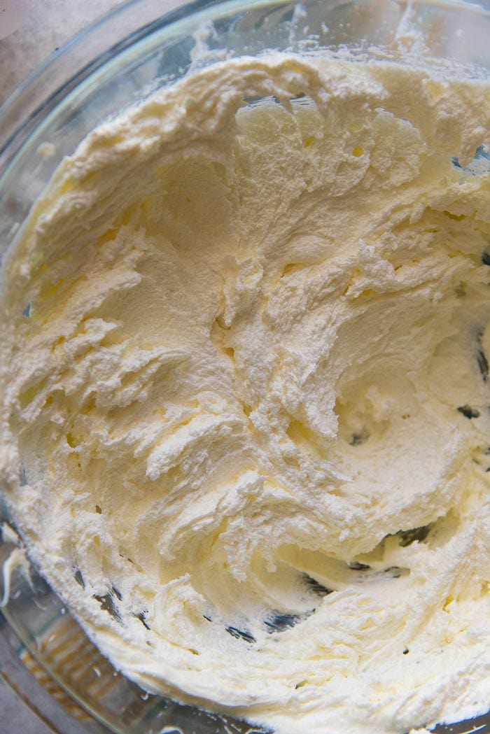 A close up of the creamed butter and sugar in the mixing bowl. 