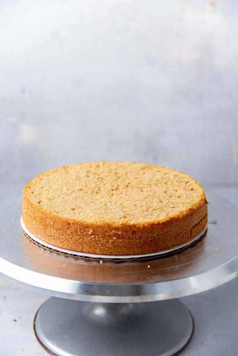 A cake layer on a cake stand