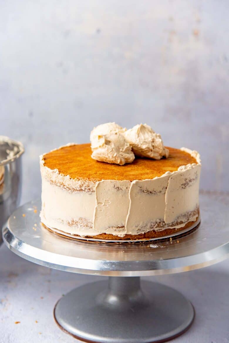 Thin layer of buttercream (crumb coating) on the side of the cake