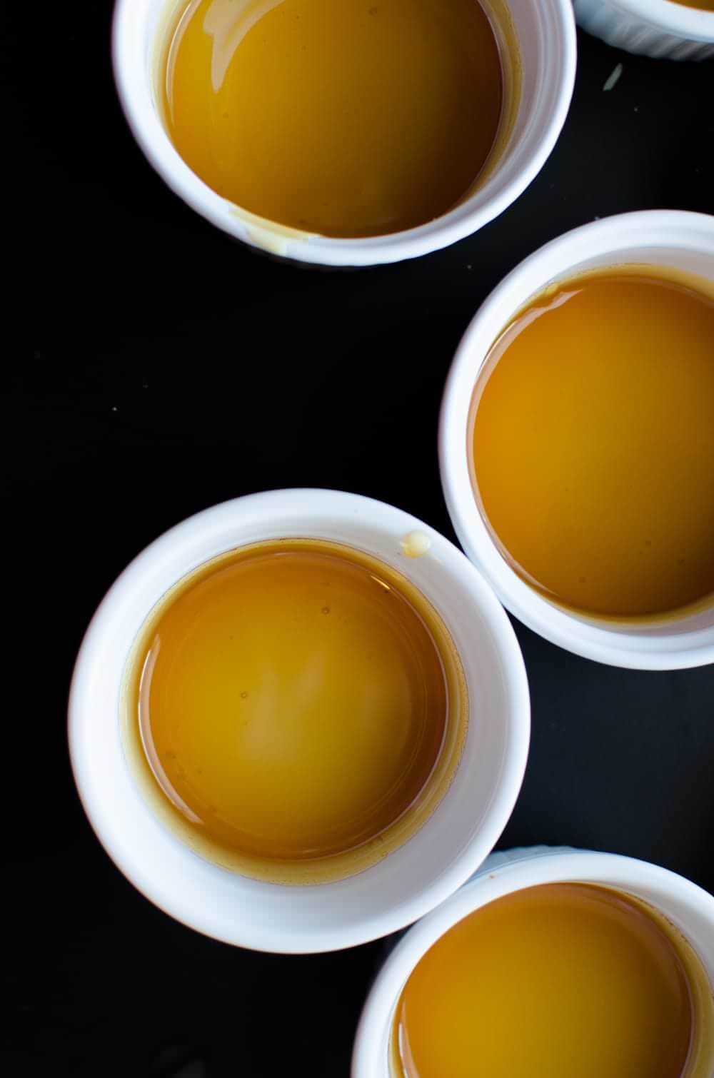 Coffee Flan - Classic Creme Caramel with a wonderful coffee twist! This Coffee creme caramel is made with coffee infused cream! Since it's so easy to make, delicate, super creamy and irrestibly addictive, it is the most requested dessert in our home. REPIN to save. CLICK to get the recipe. #TheFlavorBender