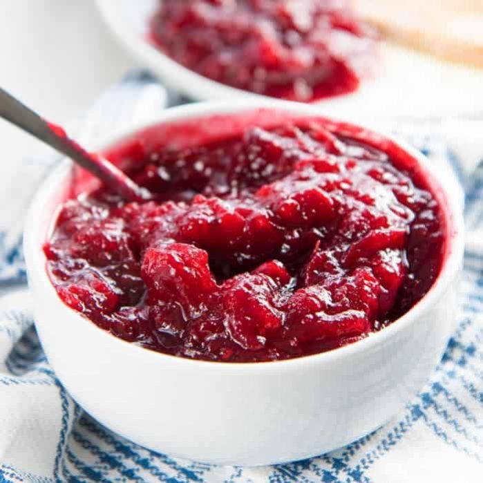 Homemade Easy Cranberry Sauce - An easy and versatile recipe to make amazing cranberry sauce for Thanksgiving! Plus, leftovers can be used in so many ways too. #ThanksgivingRecipes #CranberrySauce #EasyRecipes