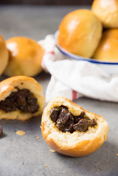 Sri Lankan Curried Beef buns - These Sri Lankan meat buns are so versatile and flavorful. Pillowy bread stuffed with curried beef. Great on the go breakfast idea, lunch or snack. 