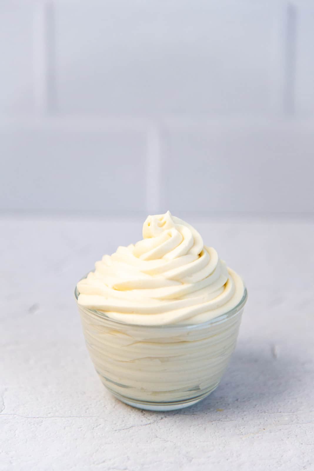 Diplomat cream piped into a small bowl.