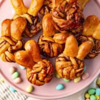Overhead image of Easter bunny buns showing big floppy bunny ears and sweet chocolate filling in the bread rolls.