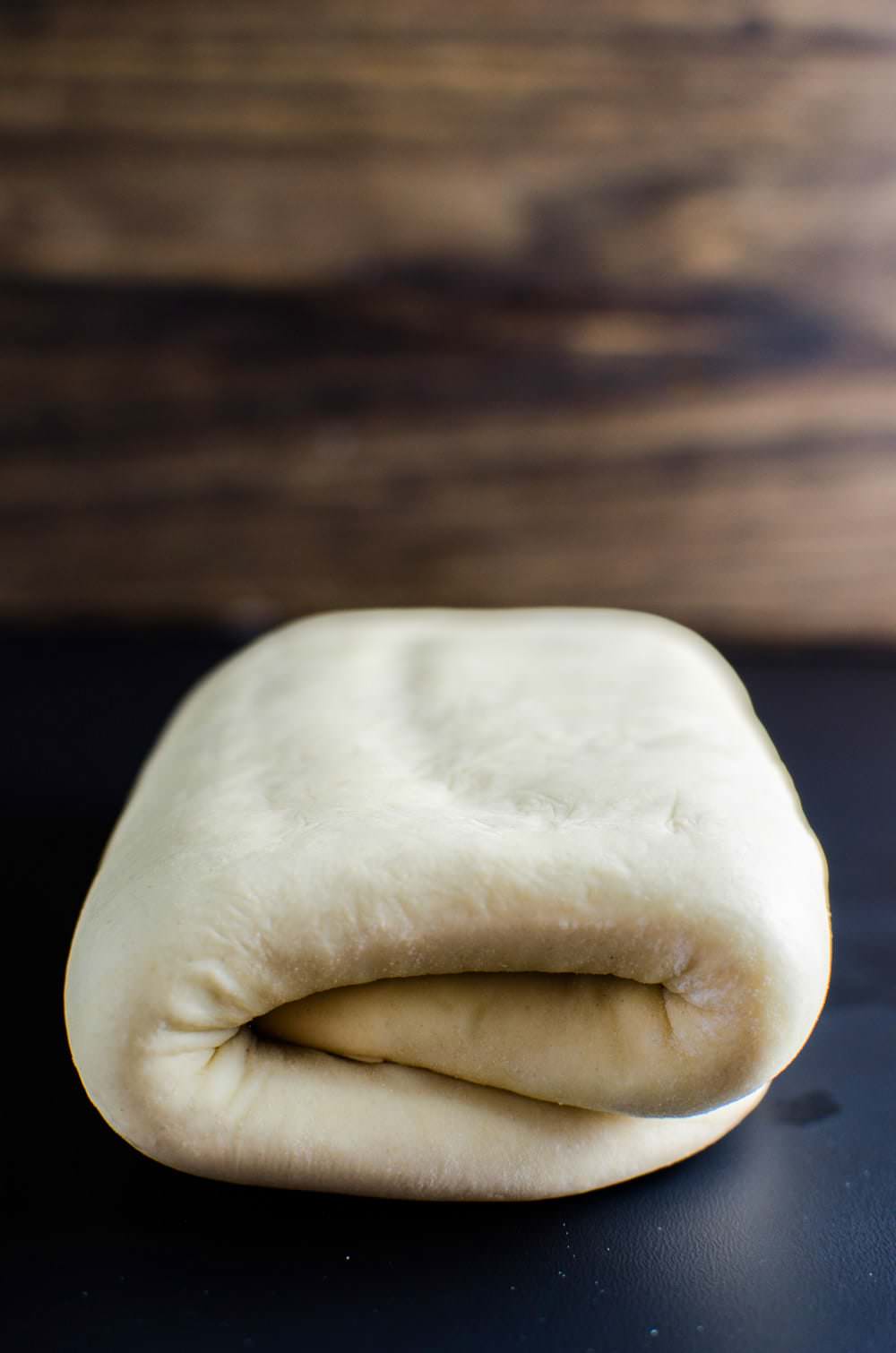 The pastry folded over after being laminated. It needs to be chilled afterwards. 