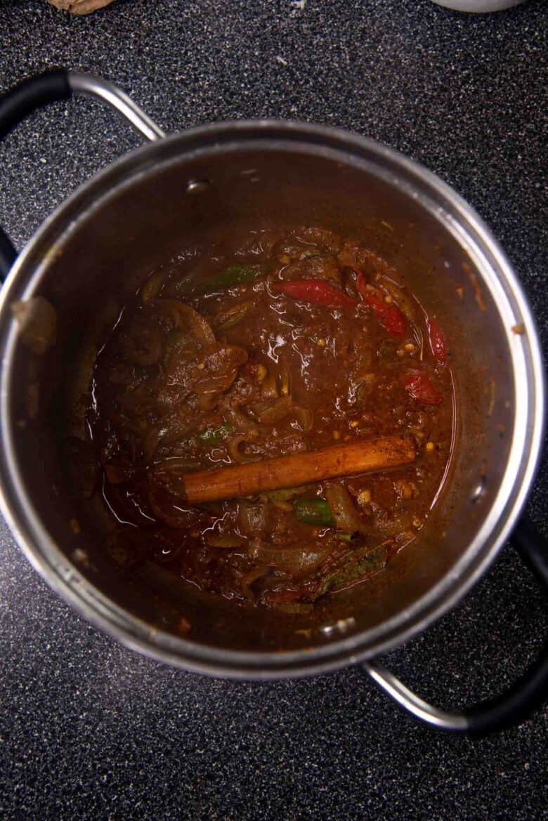 Sautéing the spices in the pot