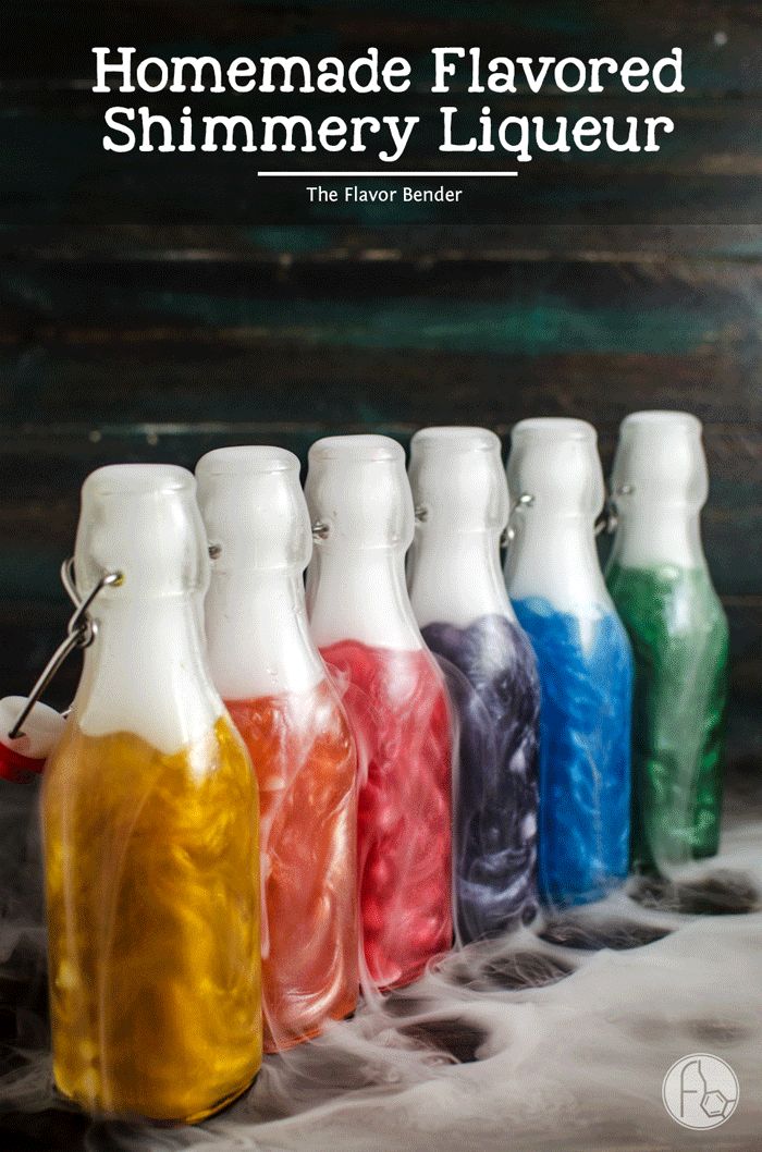 A GIF of six bottles of rainbow colored shimmering liqueur with liquid nitrogen-induced smoke coming out the top.
