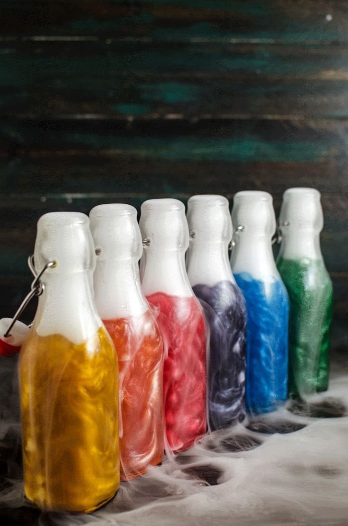 Homemade Flavored Shimmery Liqueur - I'm sharing with you how to make your own FLAVORED shimmery liqueur at home in all the colors of the rainbow, using homemade vodka infusions. Perfect for Halloween, special occasions or themed parties!
