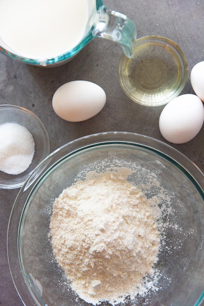 Ingredients to make Classic French Crepes or Basic crepes - Flour, Eggs, Milk, Oil, Sugar and Salt.
