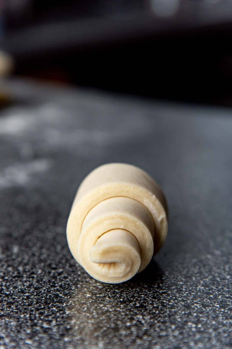 A side view of a rolled up croissant