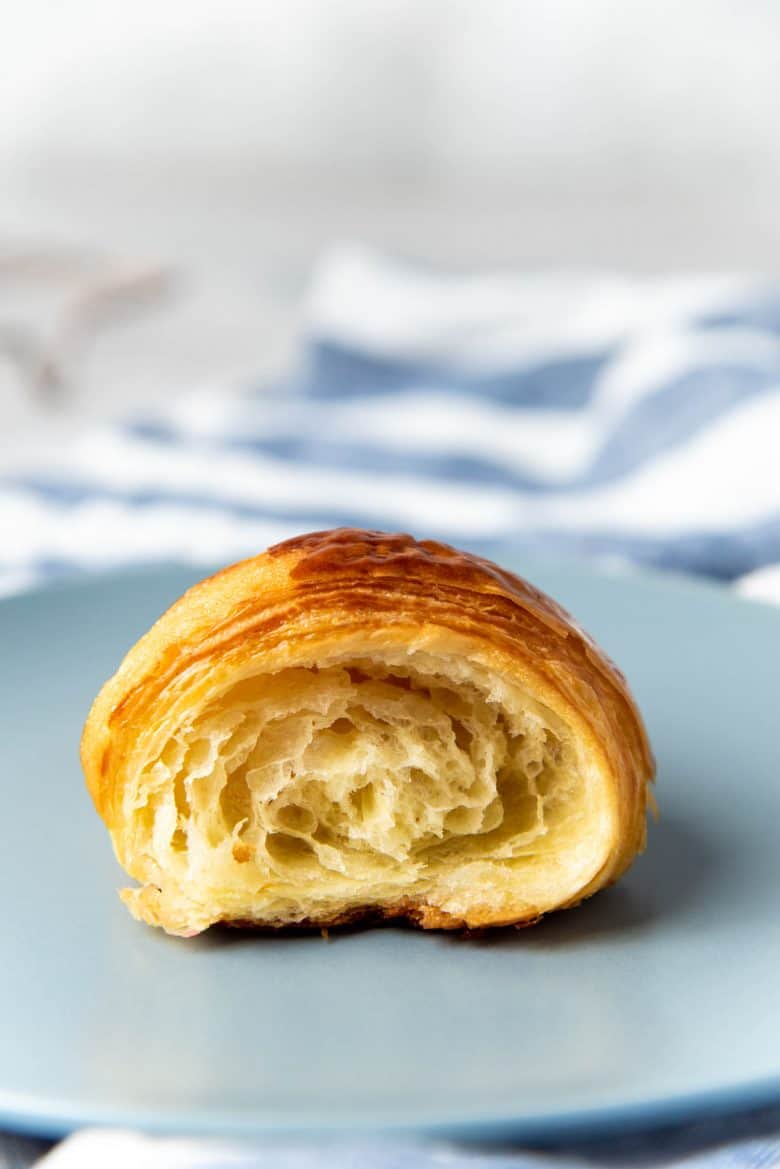 A croissant half on the plate