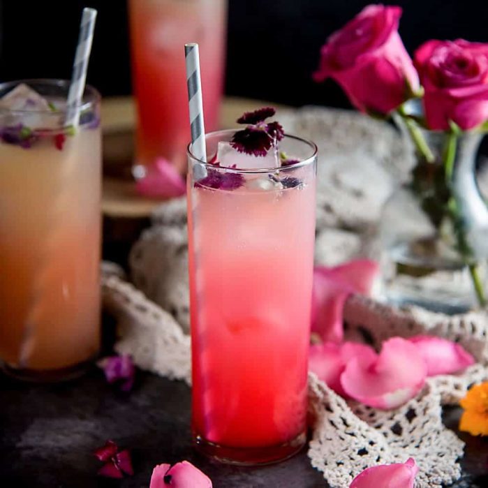 Floral Ginger Rose Fizz - A gorgeous spicy and floral mocktail made with Rose syrup, lemon juice, ginger and club soda! Perfect for Spring and Summer celebrations and especially Valentine's Day.