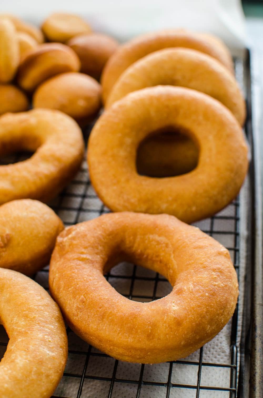 Perfect Glazed Doughnuts - The guide to Perfect Doughnuts with a vanilla glaze with a complete troubleshooting guide. Now you can have perfect doughnuts every single time