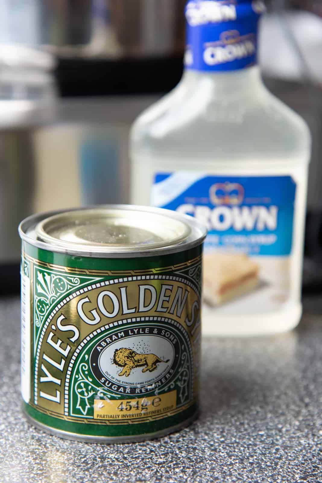 Golden syrup and corn syrup on a counter top