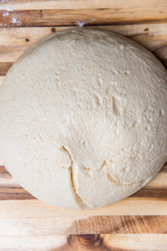The dough turned out onto a lightly floured surface.