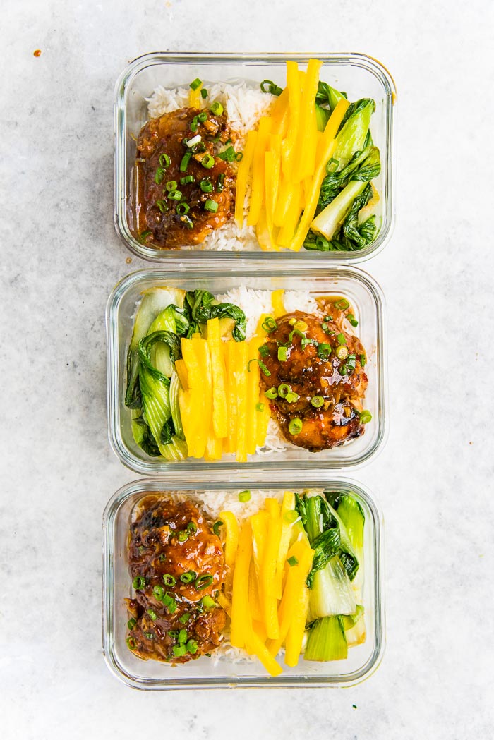 Instant pot honey soy chicken thighs used for meal prep lunch boxes for the week, with the vegetables and rice.