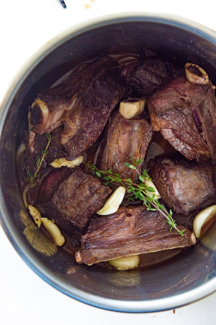 All the ingredients for the short ribs in the Instant Pot, just before being cooked in the pressure cooker. 