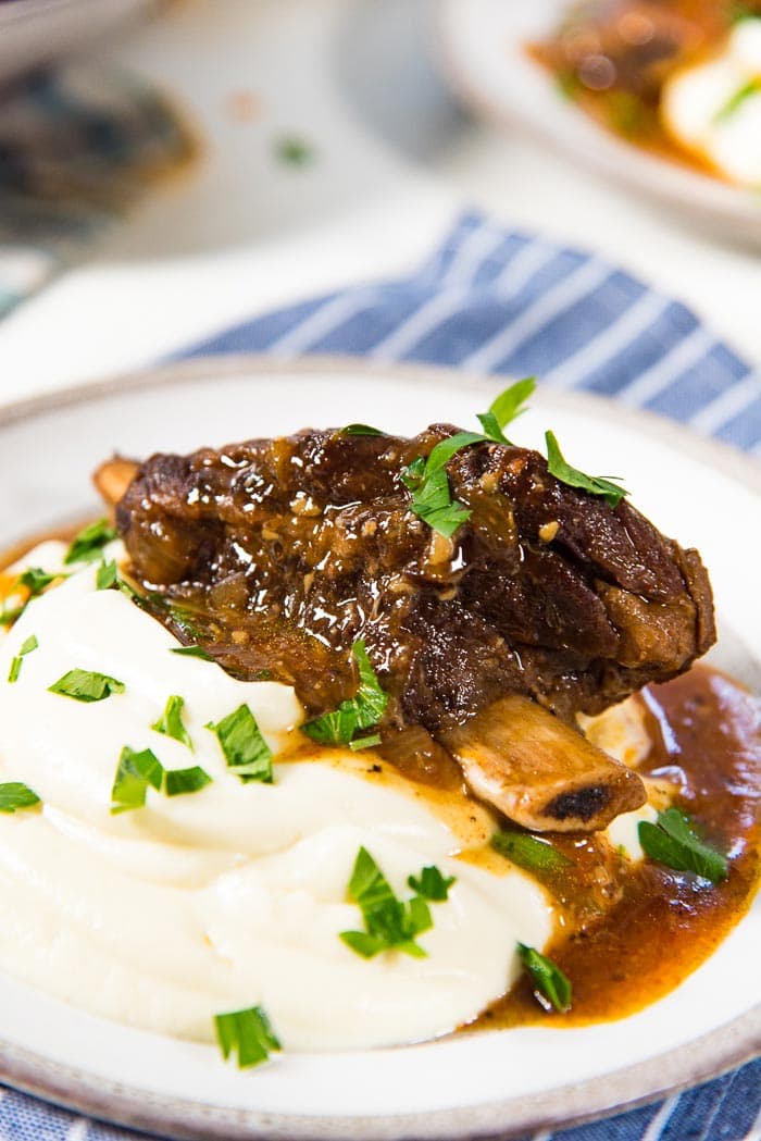 How to make Instant Pot Short Ribs - This easy recipe makes delicious, tender and succulent short ribs with classic flavors!