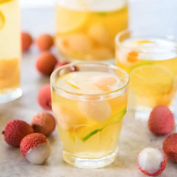 Ginger Lychee Sangria Blanca - An ice-cold, boozy Pinot grigio sangria drink with an explosion of flavors, perfect for hot summer days and evenings! 