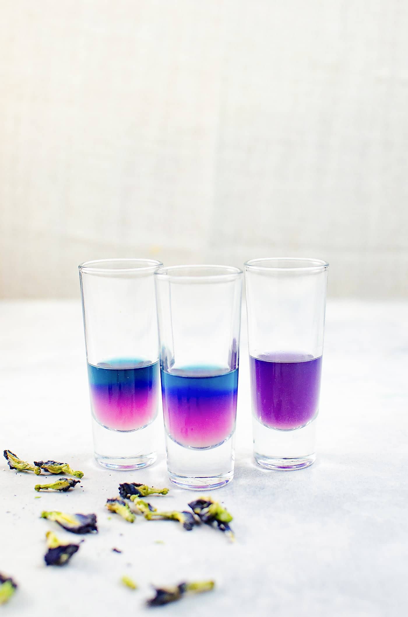 Magical Color Changing Alcohol (Vodka, Gin and Tequila) - wow your friends and family at your next get-together by making color changing magic cocktails with naturally infused color changing alcohol with one (not so) secret ingredient!