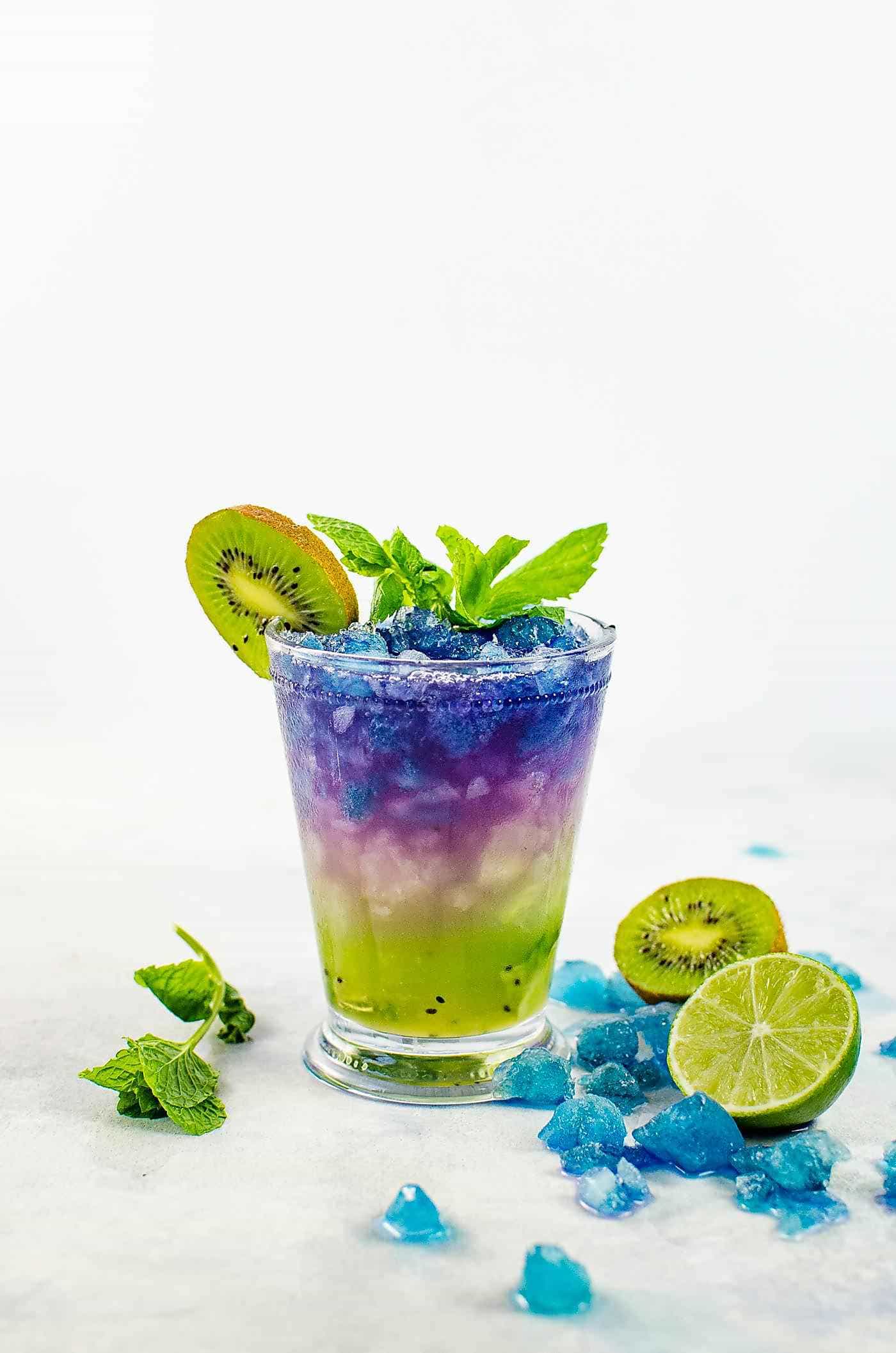 Magical Color Changing Cocktails (Galaxy Cocktails) - Mermaid Kiwi Lime Julep - Four incredible Magical Cocktails to make and be inspired to make your own! Wow your friends and family with these fun and unique cocktails made with color changing alcohol. 