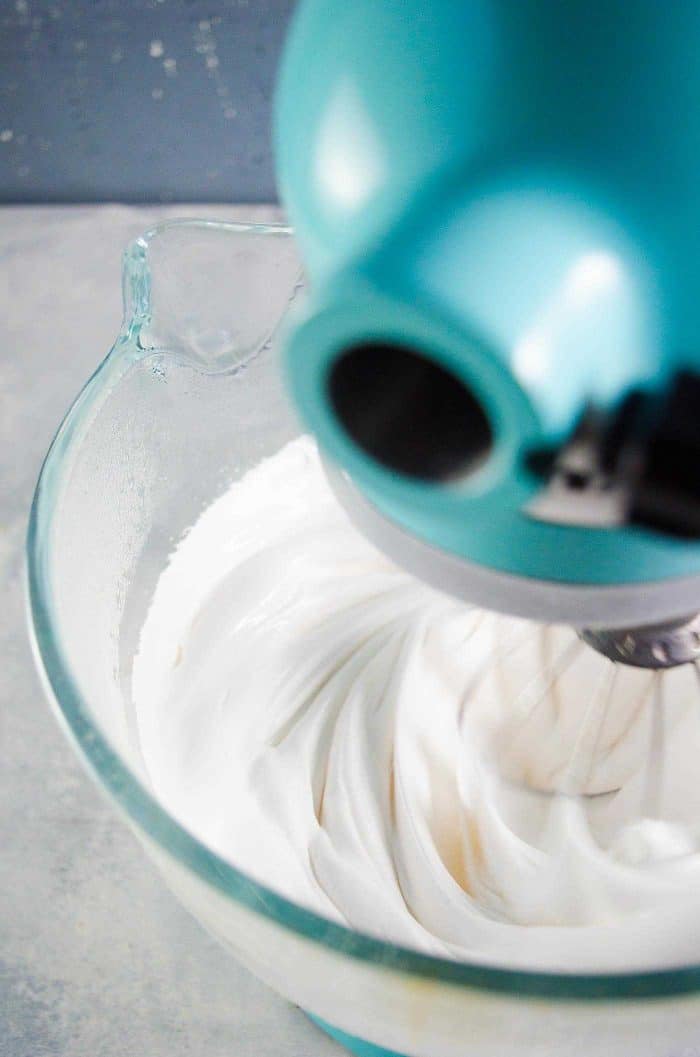 Homemade marshmallows - Midway through whipping the gelatin sugar mix. The mix is still runny, but has foamed up.