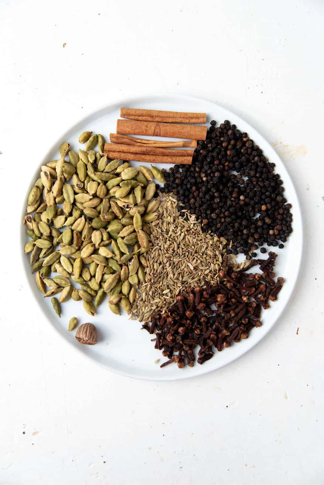 Whole spices used to make the spice mix for the tea