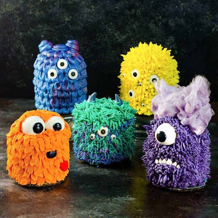 Mini Monster Cakes (Halloween Cakes) - A cake recipe for fudgy Chocolate Sheet cake and a full step by step tutorial to make 5 mini monster cakes that are perfect for Halloween Parties or Monster themed parties. 