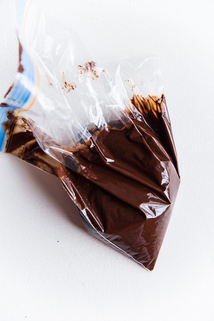 Melted peppermint chocolate in a ziploc bag