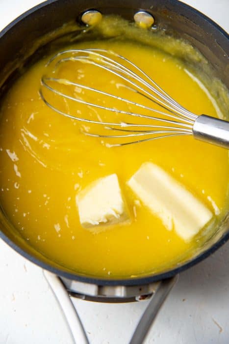 Lemon curd thickened after cooking with eggs, and adding butter.