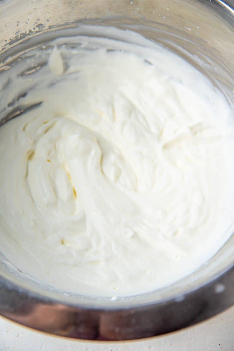 Softly whipped cream in a bowl