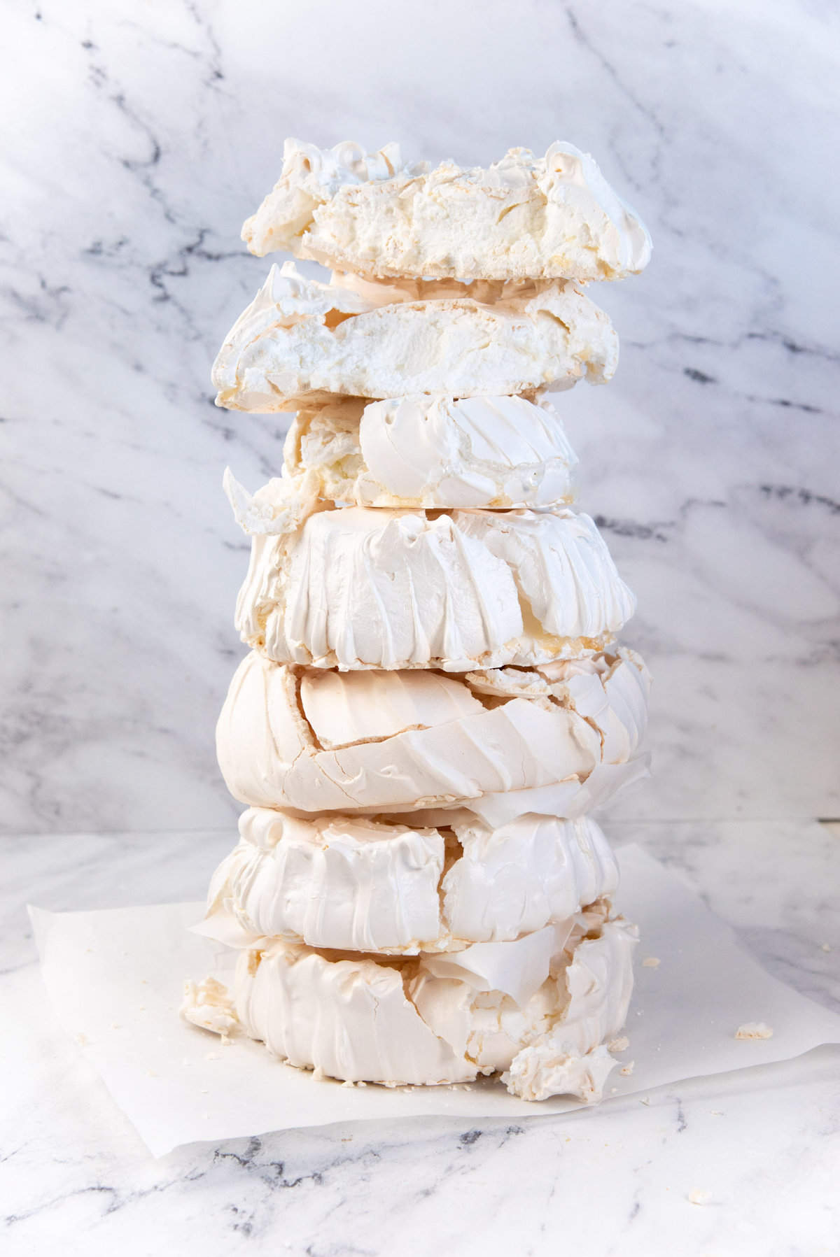 An image of several pavlovas that have been piled up as a tower.